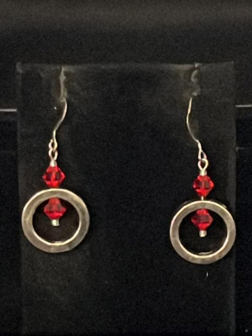 Open Silver Tone Circle with 2 Faceted Red Beads Earrings